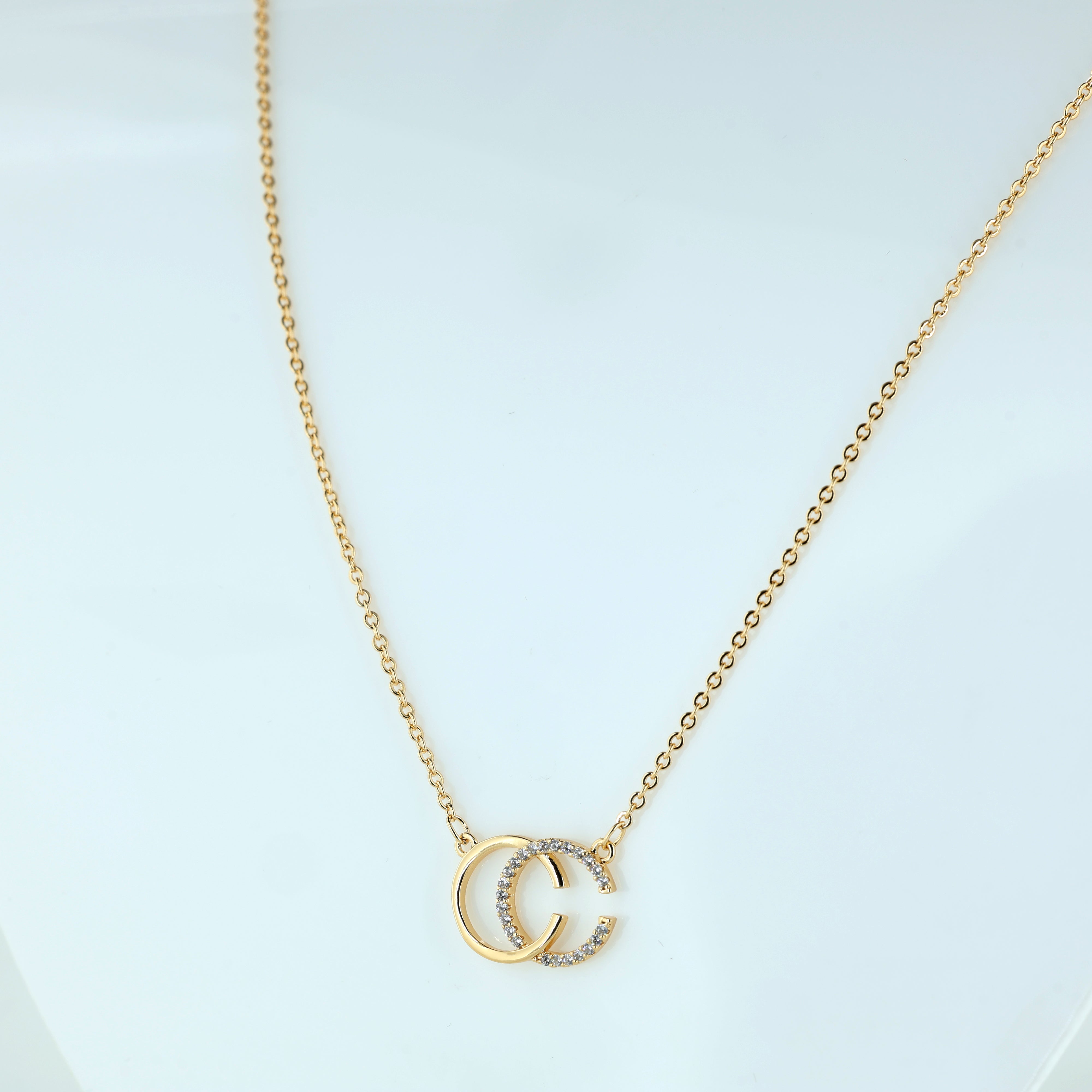 Interlocking Circle Rose Gold Pendant Necklace with Sparkling Crystals