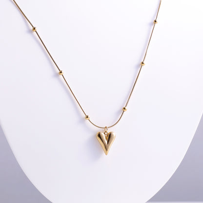 Stylish Gold Heart Necklace with Decorative Beaded