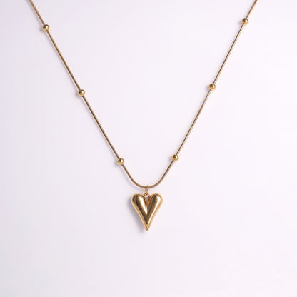 Stylish Gold Heart Necklace with Decorative Beaded