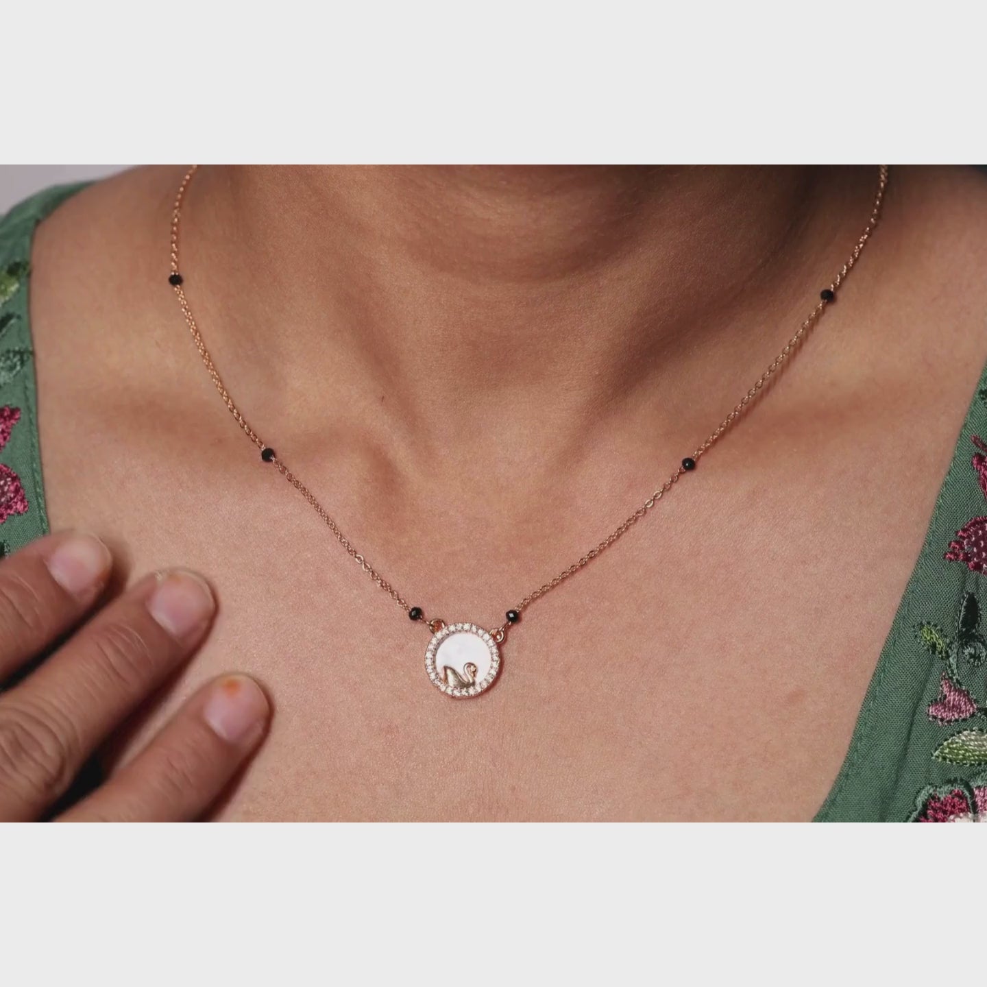 Load video: Serene Swan Halo Mangalsutra