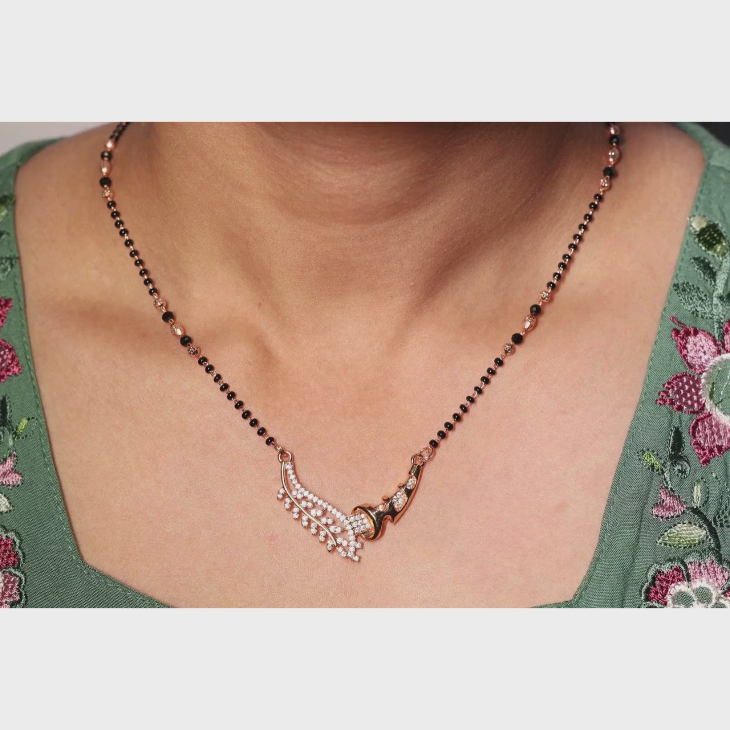 Load video: Elegant Leaf Curve Mangalsutra